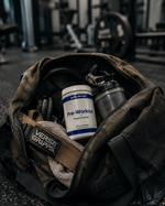 Pump The Fuel Tropical Sunrise pre-workout powder packed with a shaker, headphones and workout accessories